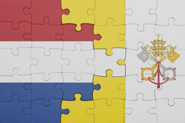 Vatikan 'ın renkli ulusal bayrağı ve Hollanda bayrağıyla ilgili bulmacalar. konsept