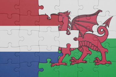 Galler 'in renkli ulusal bayrağı ve Hollanda bayrağıyla ilgili bulmacalar. konsept