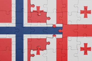 Gürcistan 'ın renkli ulusal bayrağı ve Norveç bayrağının bulmacası. konsept