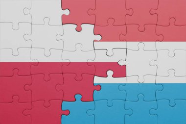 Lüksemburg 'un renkli ulusal bayrağı ve Polonya bayrağı. konsept