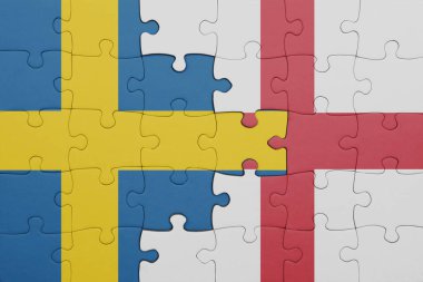İngiltere 'nin renkli ulusal bayrağı ve İsveç bayrağı. konsept