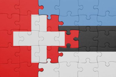 Estonya 'nın renkli ulusal bayrağı ve İsviçre bayrağıyla ilgili bulmacalar. konsept