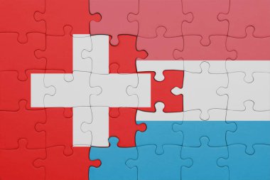 Lüksemburg 'un renkli ulusal bayrağı ve İsviçre bayrağı. konsept