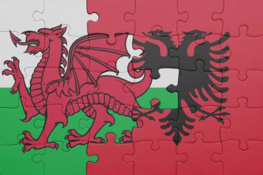 Albania 'nın renkli ulusal bayrağı ve Galler bayrağı ile bulmaca. konsept