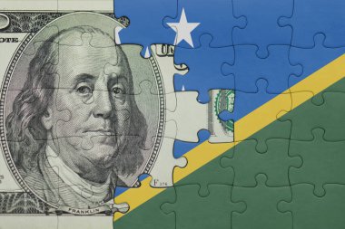 Solomon Adaları 'nın renkli ulusal bayrağı ve Amerikan doları para kavramı ile bulmaca.
