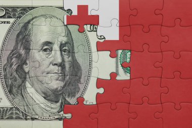 Tonga 'nın renkli ulusal bayrağı ve ABD doları para .finans konseptiyle bulmaca