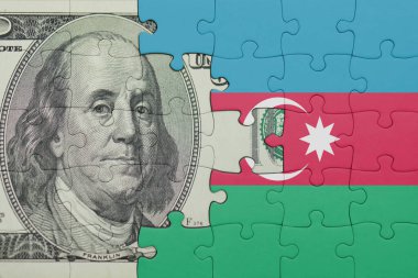 Azerbaijan 'ın renkli ulusal bayrağı ve ABD doları para .finans kavramının bulmacası