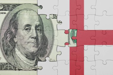 İngiltere 'nin renkli ulusal bayrağı ve ABD doları para .finans konseptiyle bulmaca
