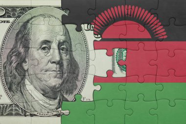 Malawi 'nin renkli ulusal bayrağı ve Amerikan doları para kavramının bulmacası.