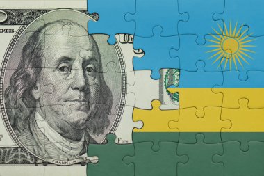 Ruanda 'nın renkli ulusal bayrağı ve Amerikan doları para kavramının bulmacası.