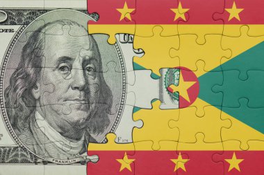 Grenada 'nın renkli ulusal bayrağı ve ABD doları para .finans konseptiyle bulmaca