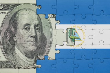 Nikaragua 'nın renkli ulusal bayrağı ve ABD doları para .finans kavramının bulmacası