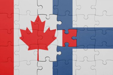 Finlandiya 'nın renkli ulusal bayrağı ve Kanada bayrağının bulmacası. konsept