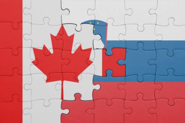 Renkli ulusal Slovenia bayrağı ve Kanada bayrağı bulmacası. konsept