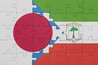 Ekvator Ginesi ve Japon bayrağının renkli ulusal bayrağıyla bulmaca. konsept