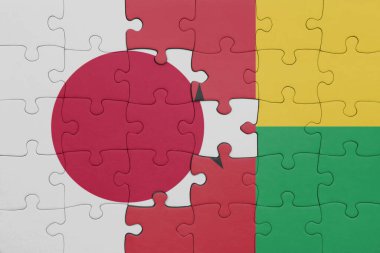 Gine bissau 'nun renkli ulusal bayrağı ve Japon bayrağı. konsept