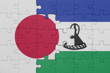 Japon bayrağı ve lesotho 'nun renkli ulusal bayrağıyla bulmaca. konsept