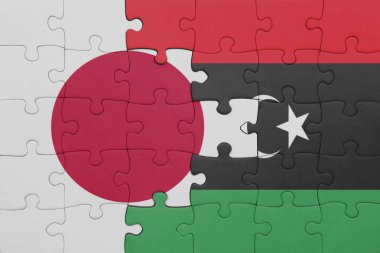 Libya 'nın renkli ulusal bayrağı ve Japon bayrağı ile bulmaca. konsept