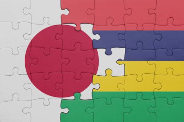 Mauritius 'un renkli ulusal bayrağı ve Japon bayrağı ile bulmaca. konsept