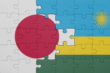 Ruanda 'nın renkli ulusal bayrağı ve Japon bayrağıyla ilgili bulmacalar. konsept