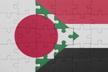 Sudan 'ın renkli ulusal bayrağı ve Japon bayrağı ile bulmaca. konsept