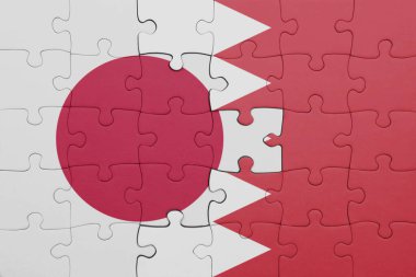 Japon bayrağı ve bahreyn 'in renkli ulusal bayrağıyla bulmaca. konsept