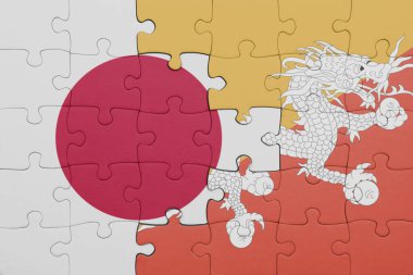 Bhutan bayrağı ve Japon bayrağı ile dolu renkli bir bulmaca. konsept