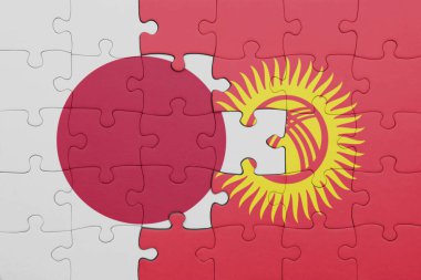 Kırgızistan 'ın renkli ulusal bayrağı ve Japonya bayrağı ile bulmaca. konsept