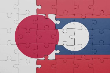 Japon bayrağı ve laoların renkli ulusal bayrağıyla bulmaca. konsept