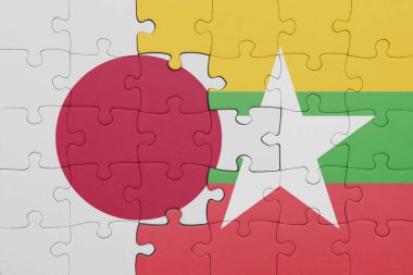 Myanmar 'ın renkli ulusal bayrağı ve Japon bayrağı ile bulmaca. konsept