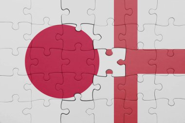 İngiltere 'nin renkli ulusal bayrağı ve Japonya bayrağı ile bulmaca. konsept