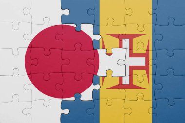 Renkli ulusal madeira bayrağı ve Japon bayrağı ile bulmaca. konsept