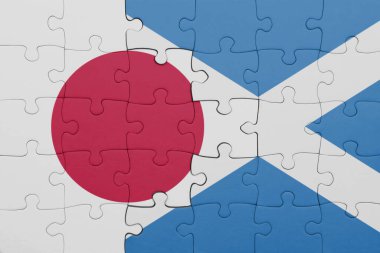 İskoçya 'nın renkli ulusal bayrağı ve Japon bayrağıyla bulmaca. konsept