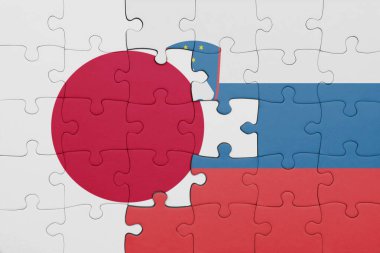 Slovenia 'nın renkli ulusal bayrağı ve Japonya bayrağı ile bulmaca. konsept