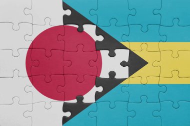 Bahamalar 'ın renkli ulusal bayrağı ve Japonya bayrağı ile bulmaca. konsept
