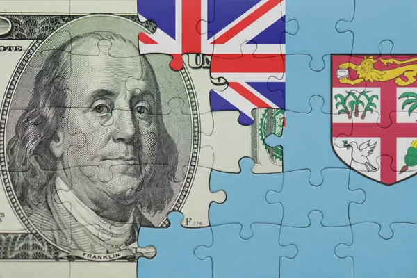 Fiji 'nin renkli ulusal bayrağı ve ABD doları para .finans konseptiyle bulmaca