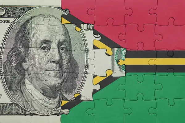 Vanuatu 'nun renkli ulusal bayrağı ve Amerikan doları para kavramının bulmacası.