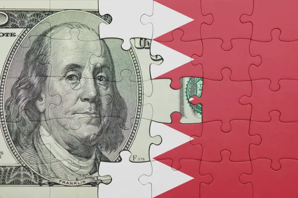 Bahreyn 'in renkli ulusal bayrağı ve ABD doları para .finans konseptiyle bulmaca