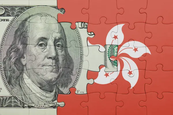 Hong Kong 'un renkli ulusal bayrağı ve Amerikan doları para kavramının bulmacası.