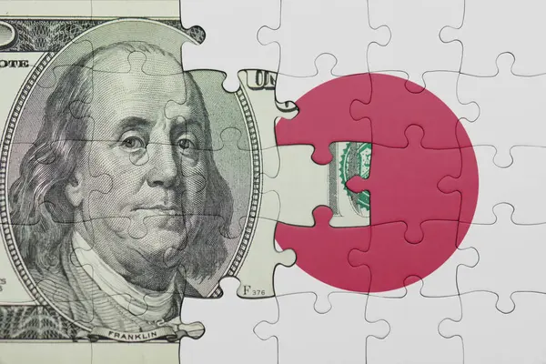 Japonya 'nın renkli ulusal bayrağı ve Amerikan doları para kavramının bulmacası.