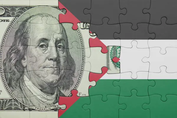Filistin 'in renkli ulusal bayrağı ve Amerikan doları para kavramının bulmacası.