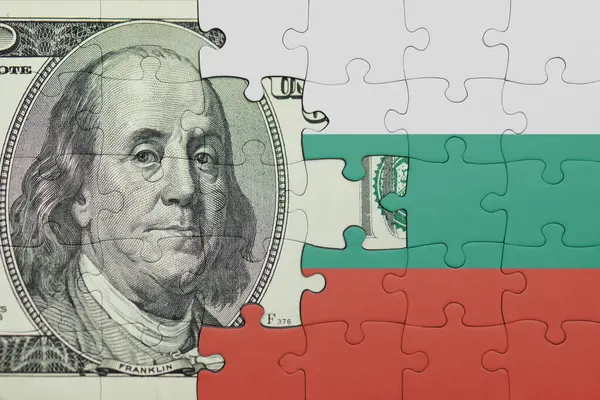 İspanya 'nın renkli ulusal bayrağı ve Amerikan doları para kavramının bulmacası.