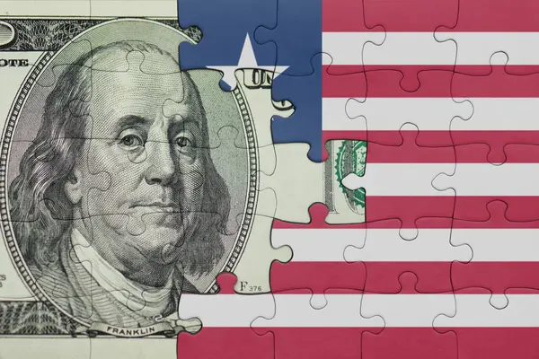 Liberya 'nın renkli ulusal bayrağı ve Amerikan doları para .finans kavramının bulmacası