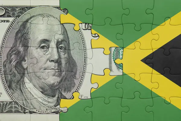 Jamaika 'nın renkli ulusal bayrağı ve Amerikan doları para kavramının bulmacası.