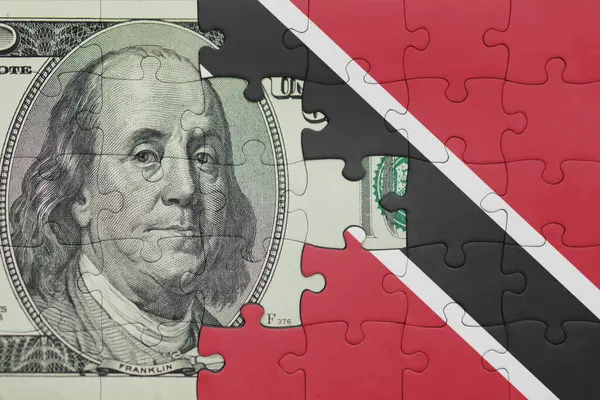 Trinidad ve Tobago 'nun renkli ulusal bayrağı ve Amerikan doları para kavramının bulmacası.
