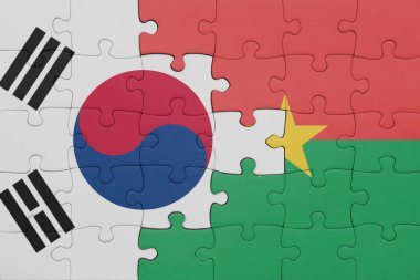 Burkina faso 'nun renkli ulusal bayrağı ve Güney Kore bayrağının bulmacası. konsept