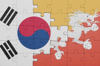 Bhutan bayrağı ve Güney Kore bayrağı ile dolu renkli bir bulmaca. konsept