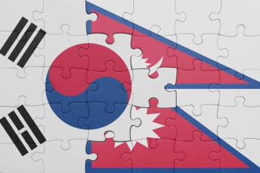 Nepal 'in renkli ulusal bayrağı ve Güney Kore bayrağının bulmacası. konsept