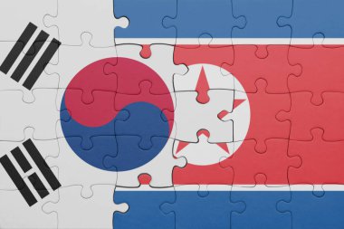 Kuzey Kore 'nin renkli ulusal bayrağı ve Güney Kore bayrağıyla ilgili bulmacalar. konsept