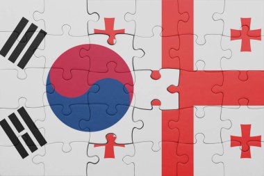 Gürcistan 'ın renkli ulusal bayrağı ve Güney Kore bayrağıyla ilgili bulmacalar. konsept